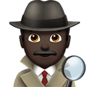 🕵🏿‍♂️ Emoji Detective Hombre: Tono De Piel Oscuro en Apple iOS 17.4.