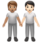 🧑🏽‍🤝‍🧑🏻 Emoji sich an den Händen haltende Personen: mittlere Hautfarbe, helle Hautfarbe Apple iOS 17.4.