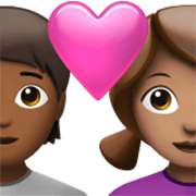 🧑🏾‍❤️‍👩🏽 Emoji Casal Apaixonado: Pessoa, Mulher, Pele Morena Escura, Pele Morena na Apple iOS 17.4.