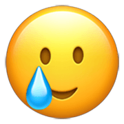 🥲 Emoji Cara sonriente con lágrima en Apple iOS 17.4.