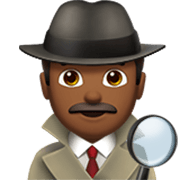 🕵🏾‍♂️ Emoji Detective Hombre: Tono De Piel Oscuro Medio en Apple iOS 17.4.