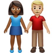 👩🏾‍🤝‍👨🏼 Emoji Mann und Frau halten Hände: mitteldunkle Hautfarbe, mittelhelle Hautfarbe Apple iOS 17.4.