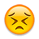 Emoji 😣 Faccina Perseverante su Apple iOS 4.0.
