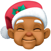 🧑🏾‍🎄 Emoji Mx Claus: Tono De Piel Oscuro Medio en Facebook 14.0.