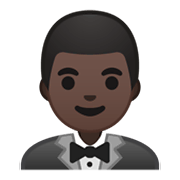 🤵🏿 Emoji Pessoa De Smoking: Pele Escura na Google Android 10.0 March 2020 Feature Drop.