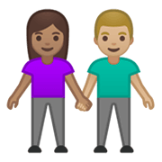 Émoji 👩🏽‍🤝‍👨🏼 Femme Et Homme Se Tenant La Main : Peau Légèrement Mate Et Peau Moyennement Claire sur Google Android 10.0.
