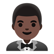 Emoji 🤵🏿‍♂️ Uomo in smoking: tonalità nera della pelle su Google Android 11.0.