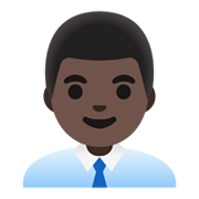 👨🏿‍💼 Emoji Oficinista Hombre: Tono De Piel Oscuro en Google Android 12L.