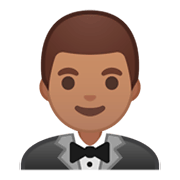 🤵🏽 Emoji Persona Con Esmoquin: Tono De Piel Medio en Google Android 9.0.