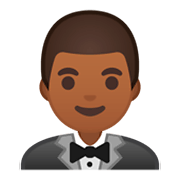 🤵🏾 Emoji Person im Smoking: mitteldunkle Hautfarbe Google Android 9.0.