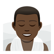 🧖🏿‍♂️ Emoji Hombre En Una Sauna: Tono De Piel Oscuro en JoyPixels 5.0.
