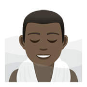 🧖🏿‍♂️ Emoji Mann in Dampfsauna: dunkle Hautfarbe JoyPixels 6.5.