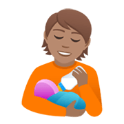 Émoji 🧑🏽‍🍼 Personne Allaitant Un Bébé : Peau Légèrement Mate sur JoyPixels 6.5.