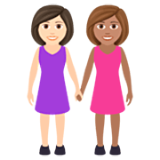 👩🏻‍🤝‍👩🏽 Emoji Duas Mulheres De Mãos Dadas: Pele Clara E Pele Morena na JoyPixels 7.0.