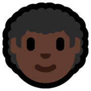 Emoji 👨🏿‍🦱 Uomo: Carnagione Scura E Capelli Ricci su Microsoft Windows 11.