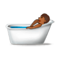 🛀🏾 Emoji Pessoa Tomando Banho: Pele Morena Escura na Samsung Experience 9.0.