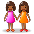 👭🏾 Emoji Mujeres De La Mano: Tono De Piel Oscuro Medio en Samsung Experience 9.0.