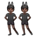 👯🏿 Emoji Personas Con Orejas De Conejo: Tono De Piel Oscuro en Samsung One UI 6.1.