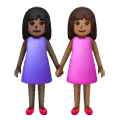 👩🏿‍🤝‍👩🏾 Emoji Mujeres De La Mano: Tono De Piel Oscuro Y Tono De Piel Oscuro Medio en Samsung One UI 6.1.