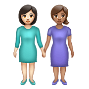👩🏻‍🤝‍👩🏽 Emoji Mujeres De La Mano: Tono De Piel Claro, Tono De Piel Medio en WhatsApp 2.21.23.23.