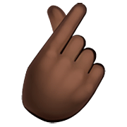 🫰🏿 Emoji Mão Com Dedo İndicador E Polegar Cruzado: Pele Escura na WhatsApp 2.22.8.79.