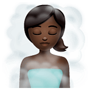 🧖🏿‍♀️ Emoji Mujer En Una Sauna: Tono De Piel Oscuro en WhatsApp 2.22.8.79.