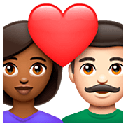 👩🏾‍❤️‍👨🏻 Emoji Pareja Enamorada - Mujer: Tono De Piel Oscuro Medio, Hombre: Tono De Piel Claro en WhatsApp 2.23.2.72.