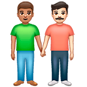 👨🏽‍🤝‍👨🏻 Emoji händchenhaltende Männer: mittlere Hautfarbe, helle Hautfarbe WhatsApp 2.23.2.72.